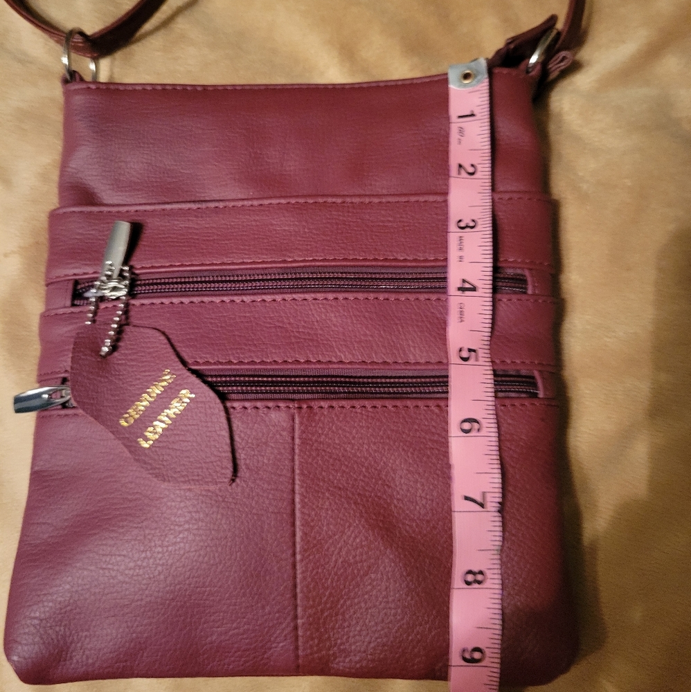 Small burgundy leather purse